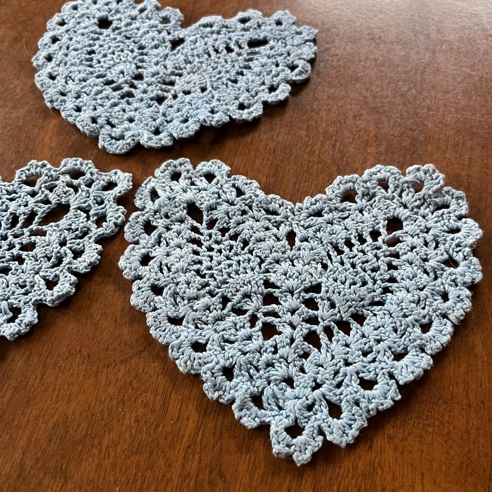 Three country blue heart doilies